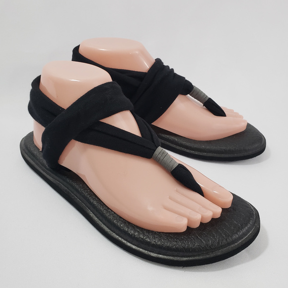black cloth flip flops